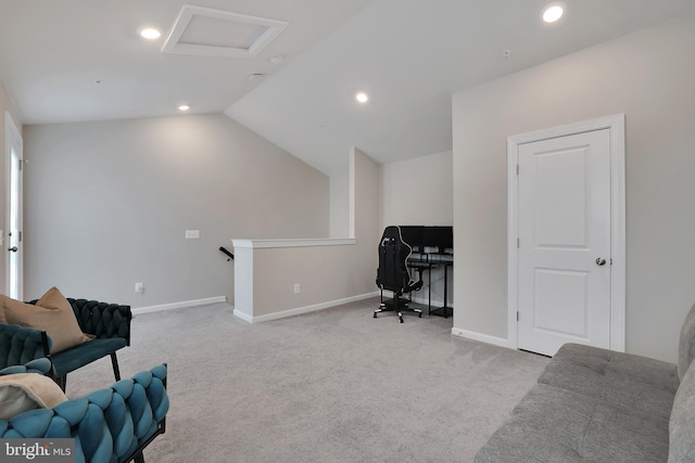 interior space with carpet, lofted ceiling, recessed lighting, attic access, and baseboards