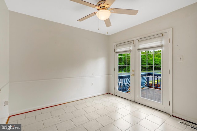 13498 Keytone Rd, Woodbridge, VA 22193 - empty room featuring a ceiling fan, baseboards, and tile patterned floors