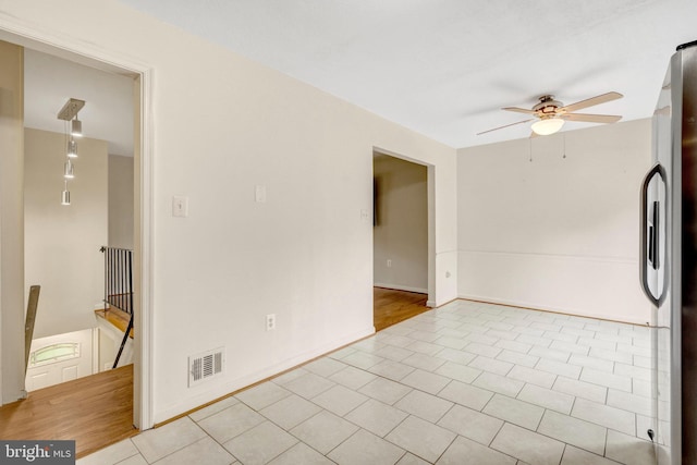 13498 Keytone Rd, Woodbridge, VA 22193 - tiled empty room featuring ceiling fan and baseboards