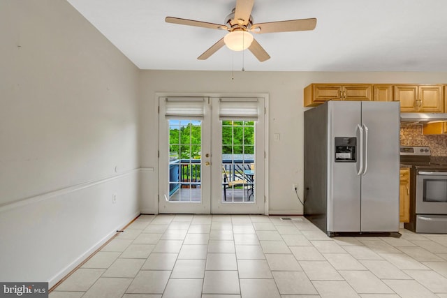 13498 Keytone Rd, Woodbridge, VA 22193 - kitchen with appliances with stainless steel finishes, a ceiling fan, under cabinet range hood, decorative backsplash, and french doors