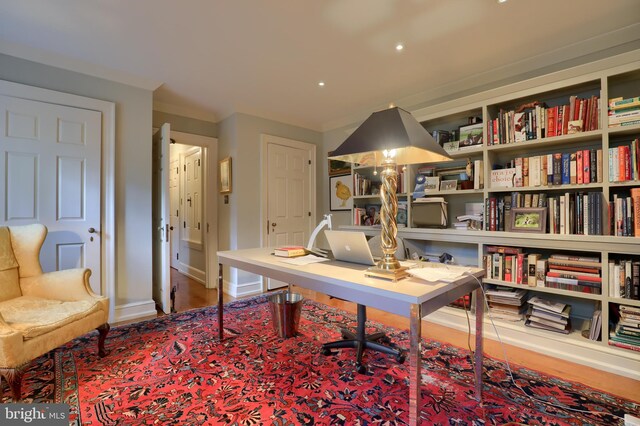 office area featuring wood finished floors and baseboards