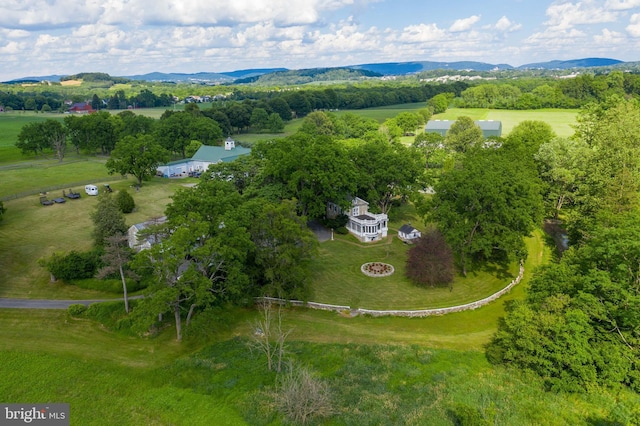 bird's eye view featuring a mountain view and a rural view