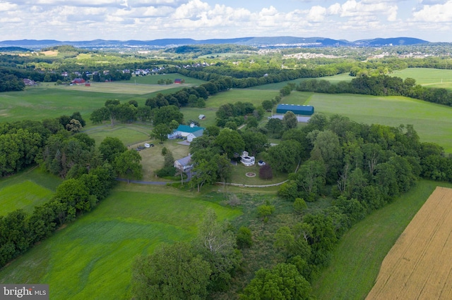 drone / aerial view with a rural view and a mountain view