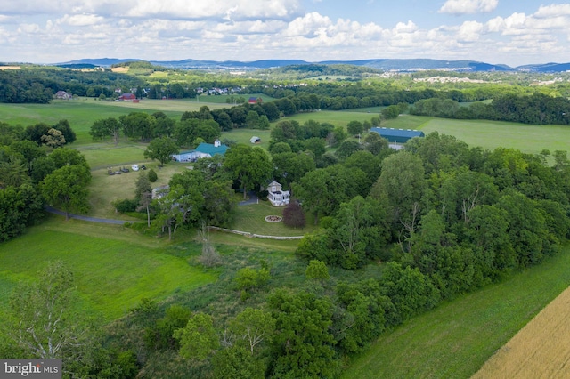 birds eye view of property featuring a rural view and a mountain view