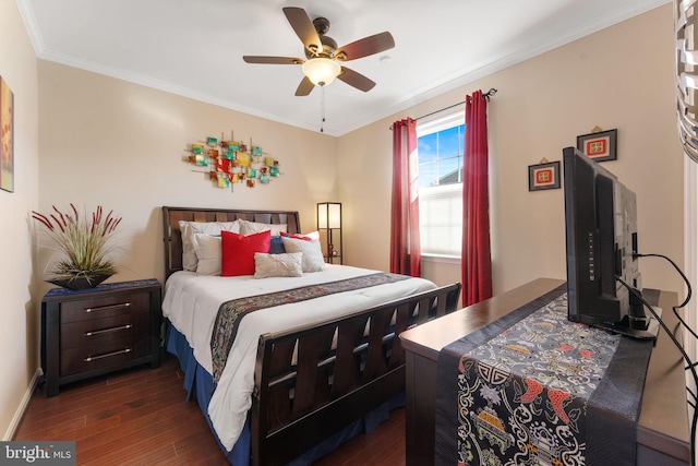 bedroom with ornamental molding, dark wood-style flooring, baseboards, and a ceiling fan