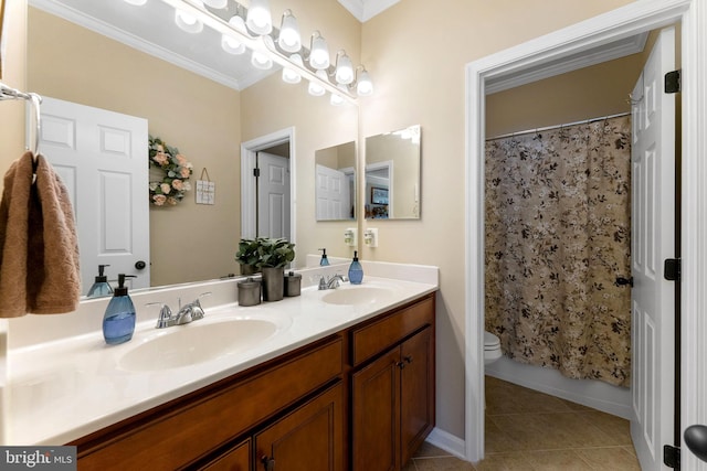 full bathroom with double vanity, tile patterned flooring, ornamental molding, and a sink