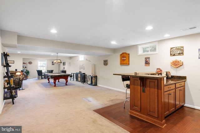 game room featuring a dry bar, baseboards, visible vents, dark carpet, and recessed lighting