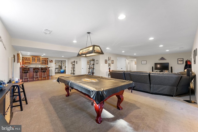 game room featuring carpet, bar area, and recessed lighting