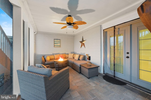 view of patio / terrace with ceiling fan and an outdoor hangout area