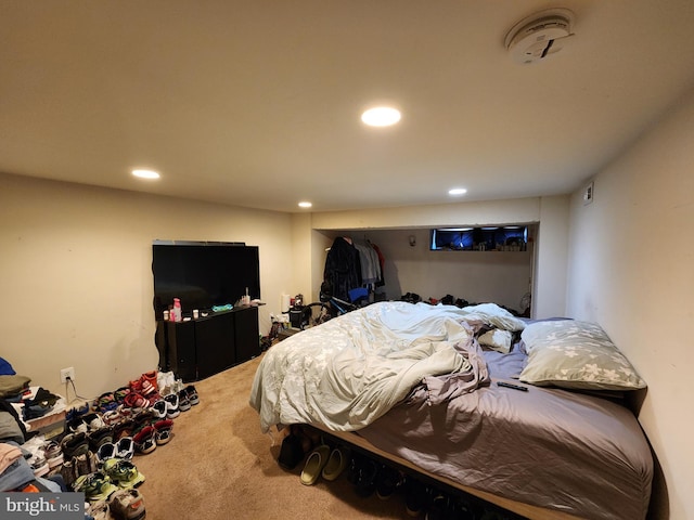 bedroom with carpet flooring and recessed lighting