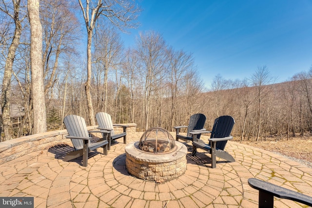 view of patio featuring a fire pit