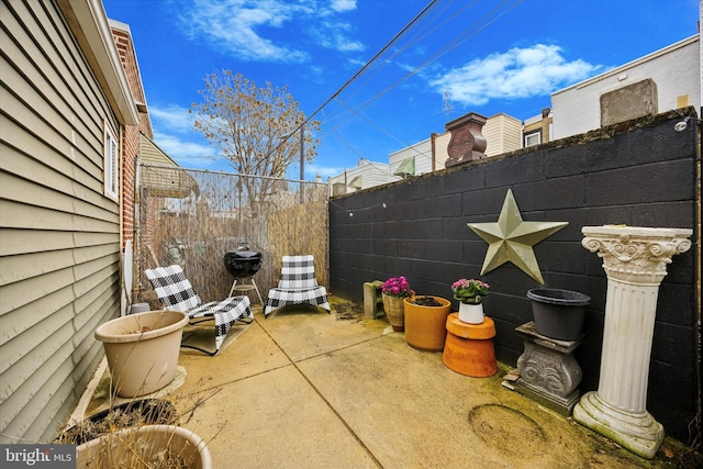 view of patio featuring a fenced backyard