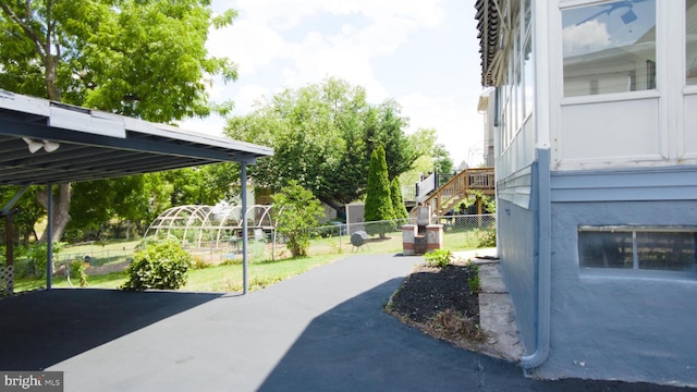 view of property's community featuring fence