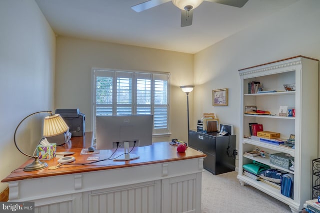 office space with ceiling fan and light colored carpet