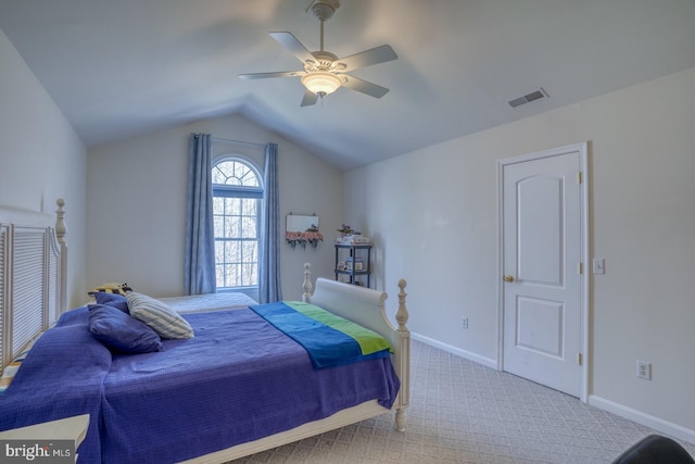 carpeted bedroom with lofted ceiling, a ceiling fan, visible vents, and baseboards