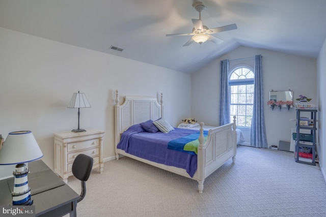 bedroom featuring lofted ceiling, ceiling fan, light carpet, and visible vents