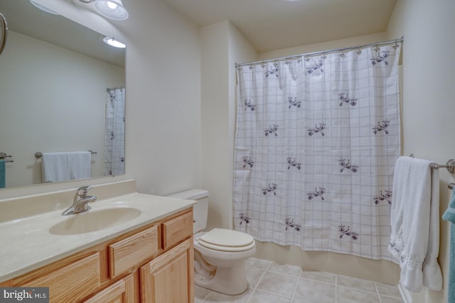 full bath featuring tile patterned flooring, shower / bathtub combination with curtain, vanity, and toilet