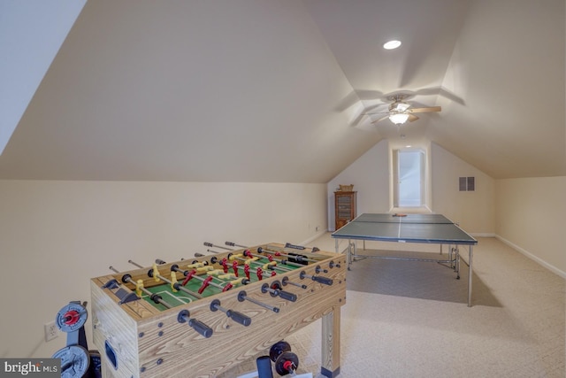 rec room featuring baseboards, visible vents, a ceiling fan, lofted ceiling, and carpet flooring