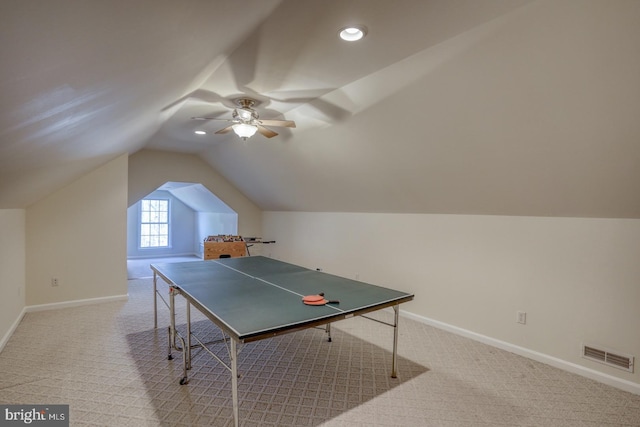 rec room with carpet, visible vents, and baseboards