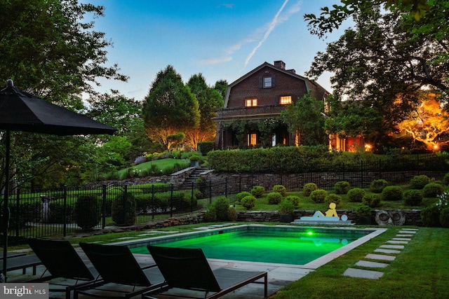 view of pool featuring a fenced in pool and fence