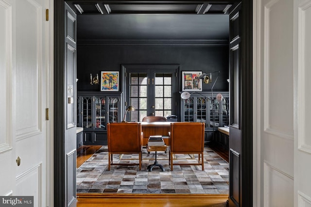 office area featuring ornamental molding, french doors, and wood finished floors