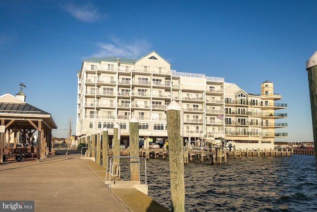 view of building exterior with a water view