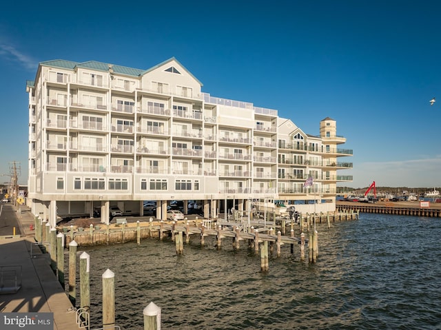 view of building exterior featuring a water view