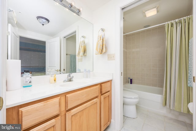 bathroom with visible vents, toilet, shower / tub combo, tile patterned floors, and vanity