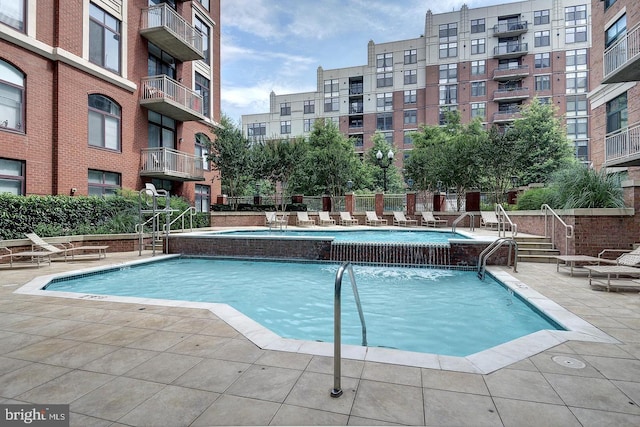 community pool with a patio