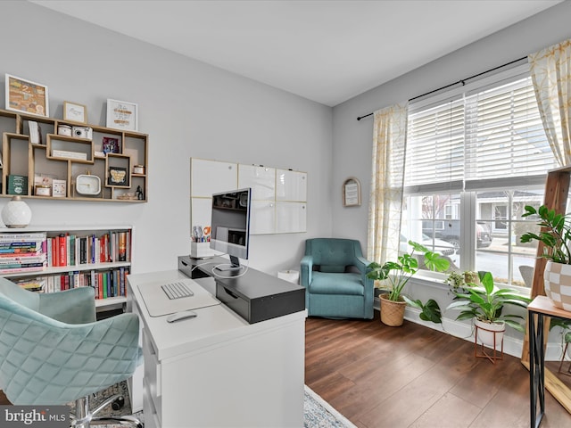 home office with wood finished floors