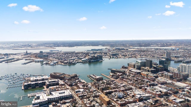 aerial view featuring a view of city and a water view