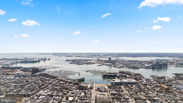 aerial view with a water view and a view of city