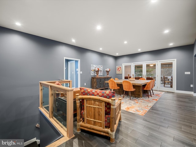 dining space with recessed lighting, french doors, baseboards, and wood tiled floor