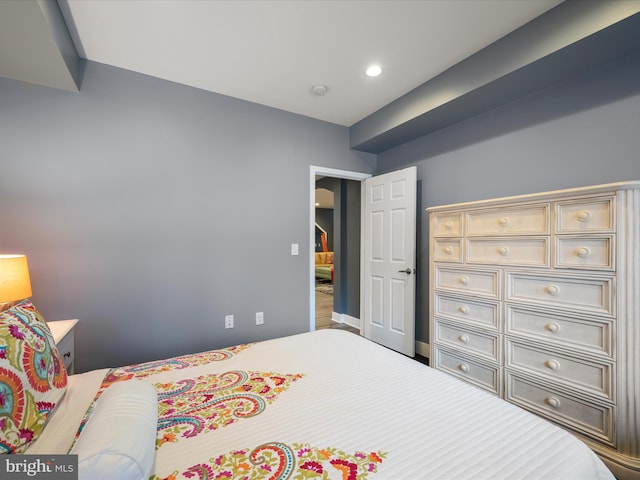 bedroom with recessed lighting