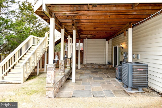 view of patio / terrace with stairs and central AC