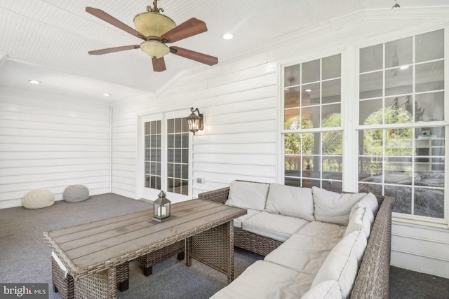 exterior space with an outdoor hangout area and a ceiling fan