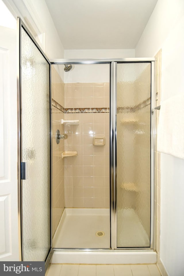 full bathroom with a stall shower