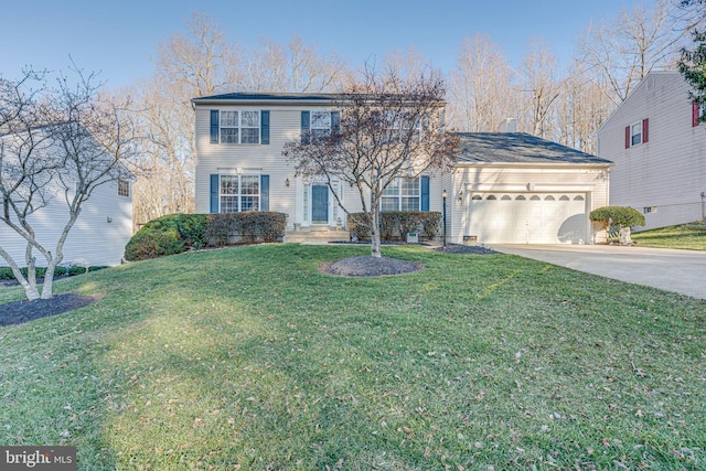 view of front of property with a garage, a front yard, and concrete driveway