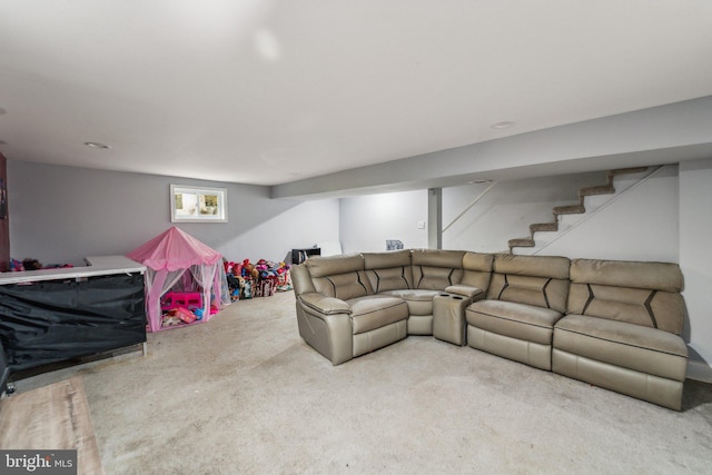 living area with stairway and carpet