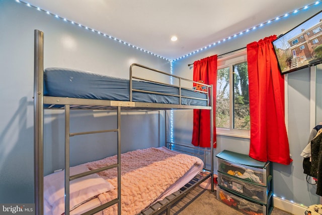 bedroom featuring recessed lighting and baseboards