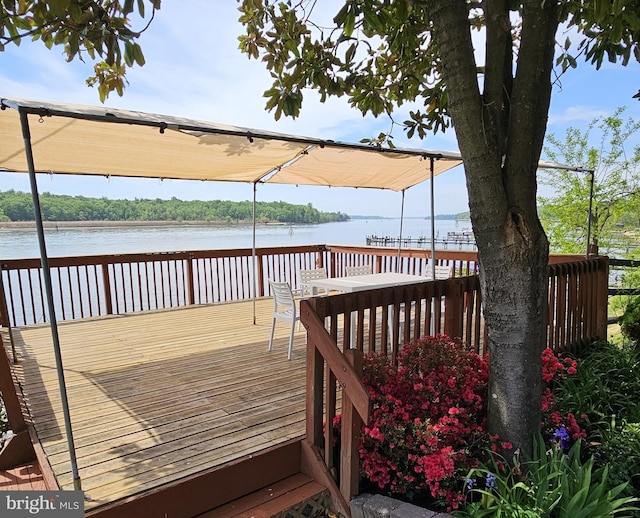 deck featuring a water view