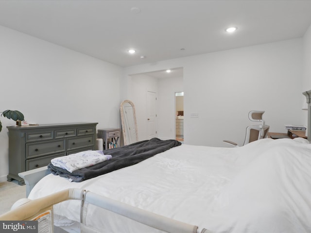 bedroom featuring recessed lighting