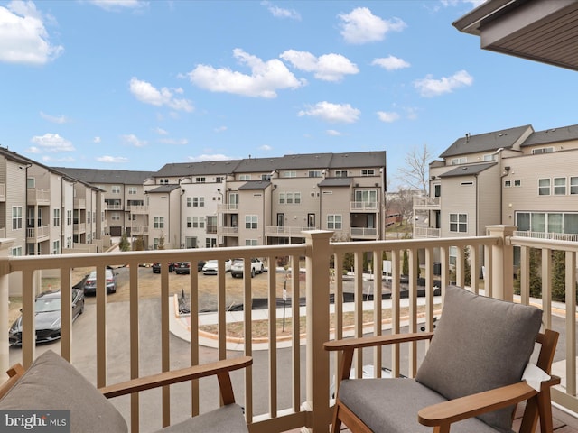 balcony featuring a residential view