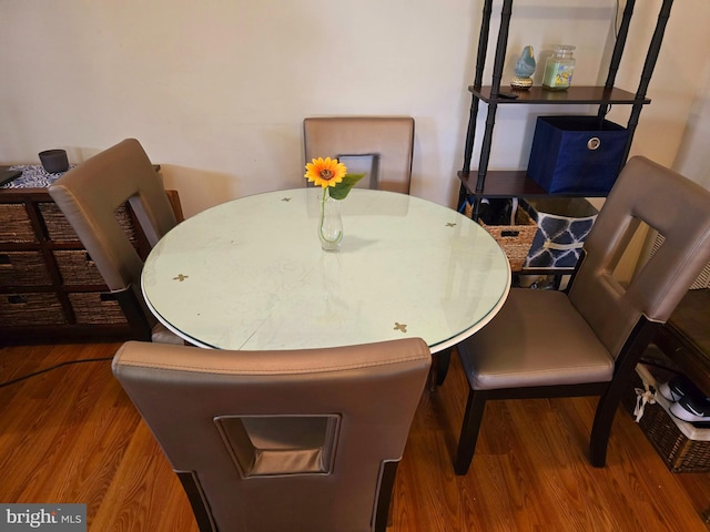 dining room with wood finished floors