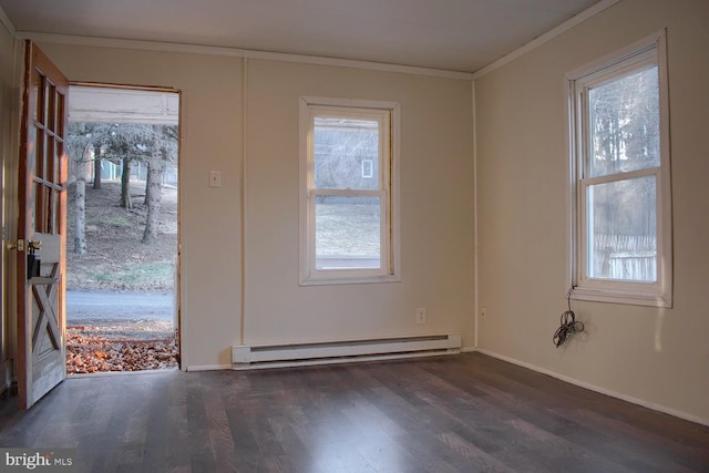 interior space featuring baseboards, crown molding, baseboard heating, and wood finished floors