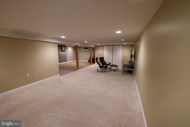 unfurnished room with recessed lighting, light colored carpet, and baseboards