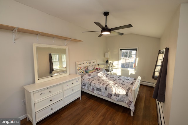 bedroom with dark wood-style floors, baseboard heating, and vaulted ceiling