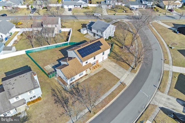 birds eye view of property with a residential view