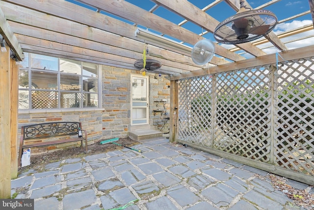 view of patio / terrace featuring a pergola and a ceiling fan