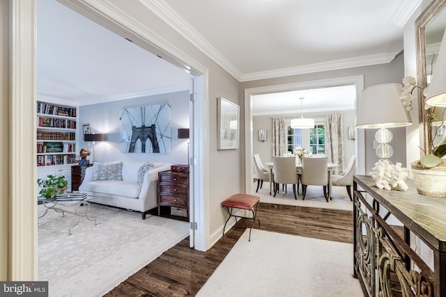 interior space with crown molding, baseboards, and dark wood-style flooring